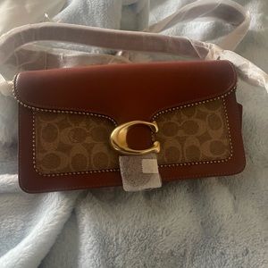 Coach crossbody bag. Tan leather